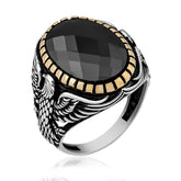 Bague pour homme en argent avec pierre taillée représentant un aigle